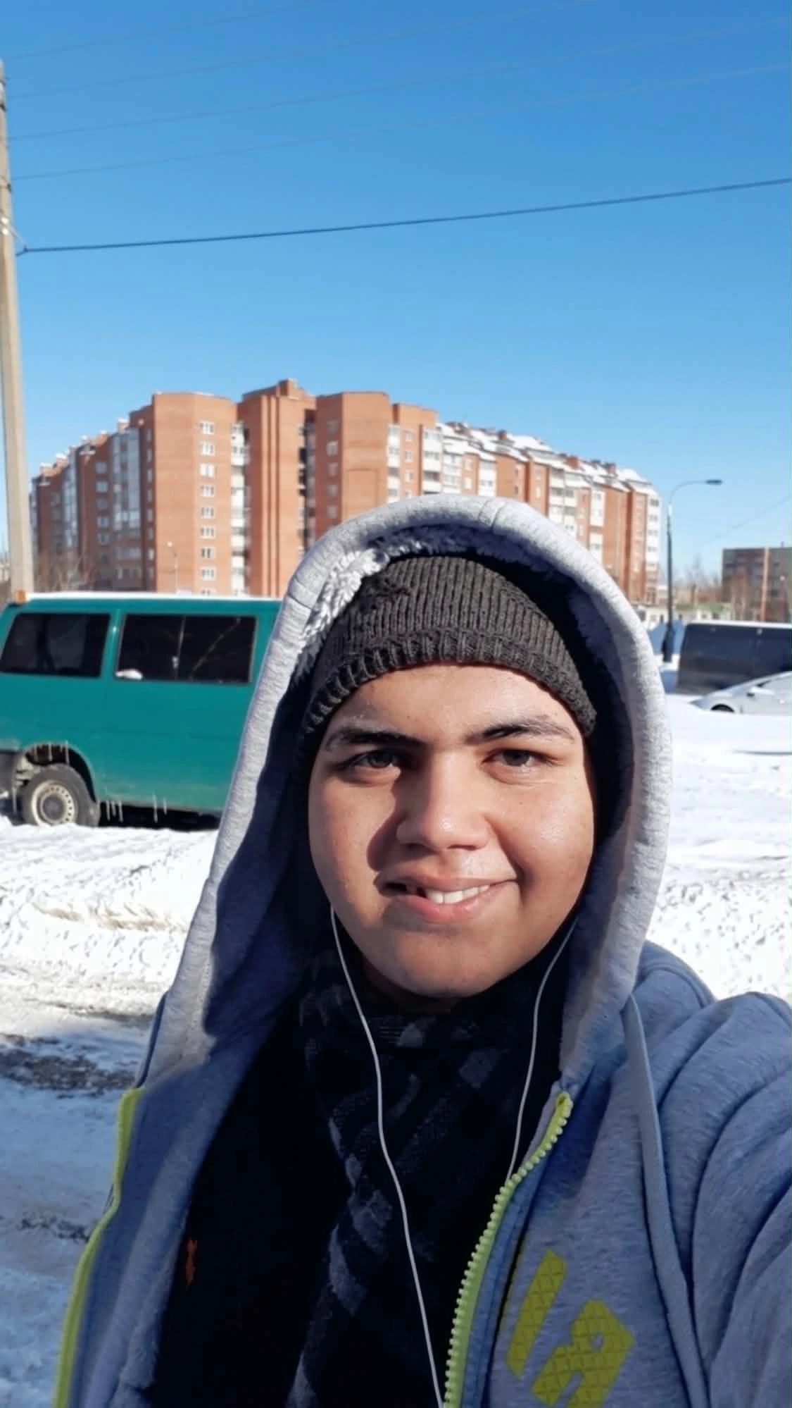 mohamed-fayiz-russia-winter-before-transformation Mohammed Fayiz outdoors in Russia during winter before his fitness transformation